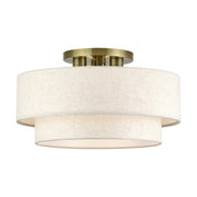 Livex Lighting - 41945-01 - Three Light Semi-Flush Mount - Manorwood - Antique Brass