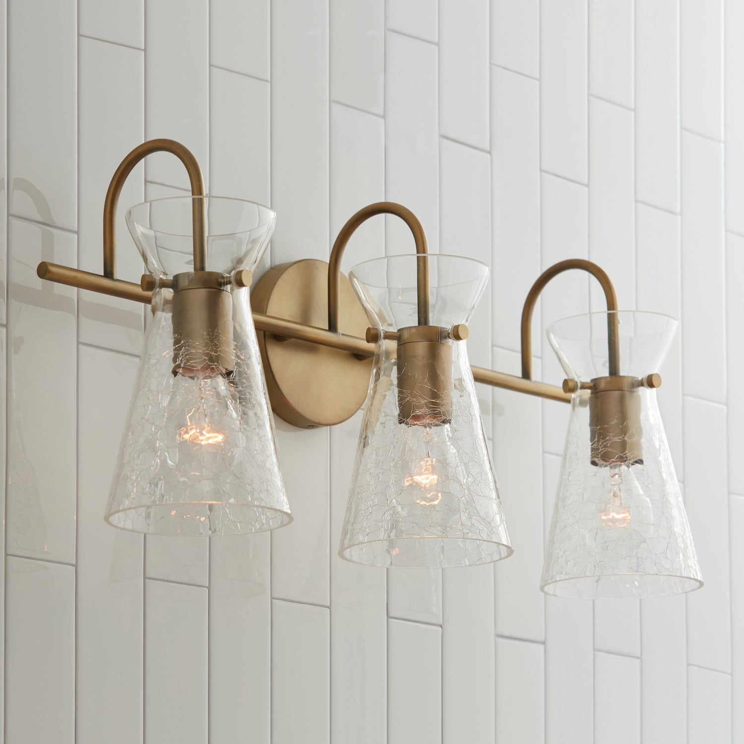 Capital Lighting - 142431AD - Three Light Vanity - Mila - Aged Brass