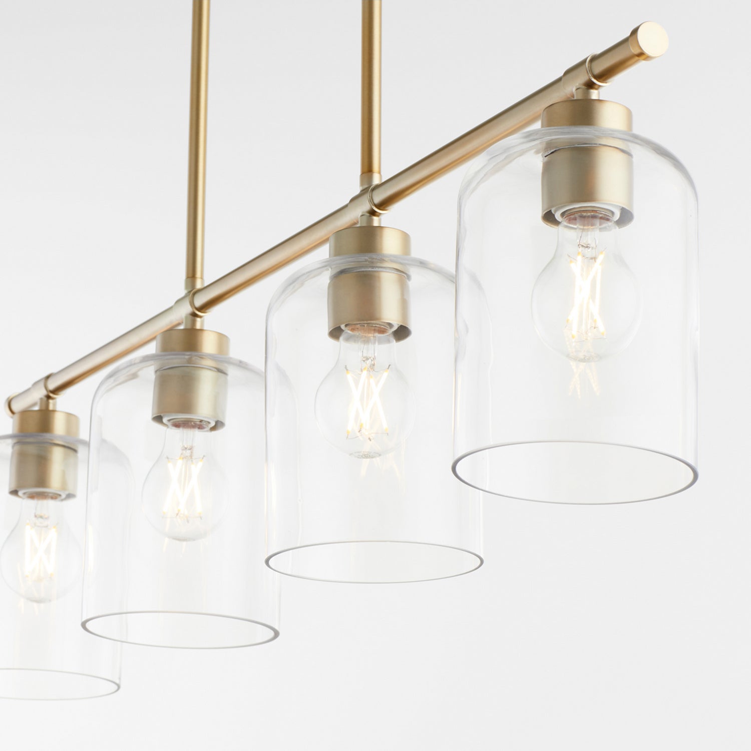 Quorum - 6574-4-80 - Four Light Linear Chandelier - Tribute - Aged Brass