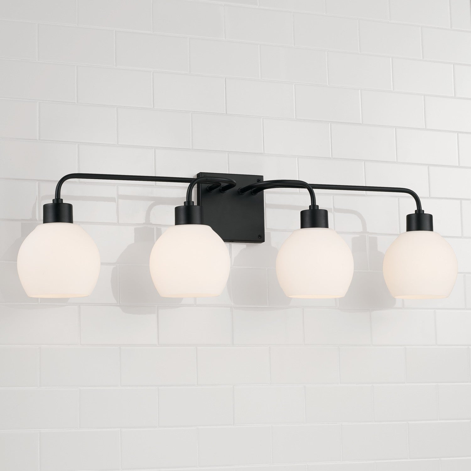 Capital Lighting - 120041MB-540 - Four Light Vanity - Tanner - Matte Black