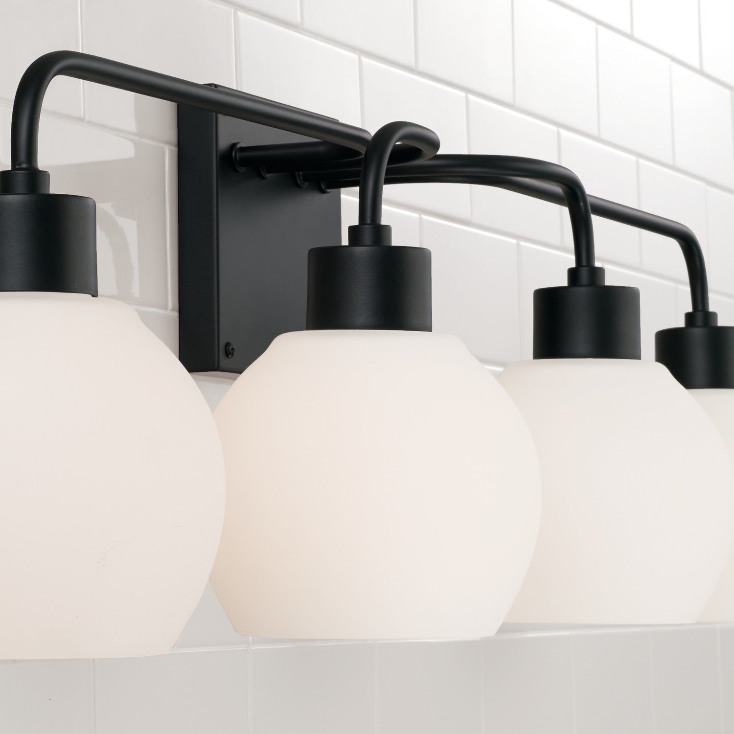 Capital Lighting - 120041MB-540 - Four Light Vanity - Tanner - Matte Black
