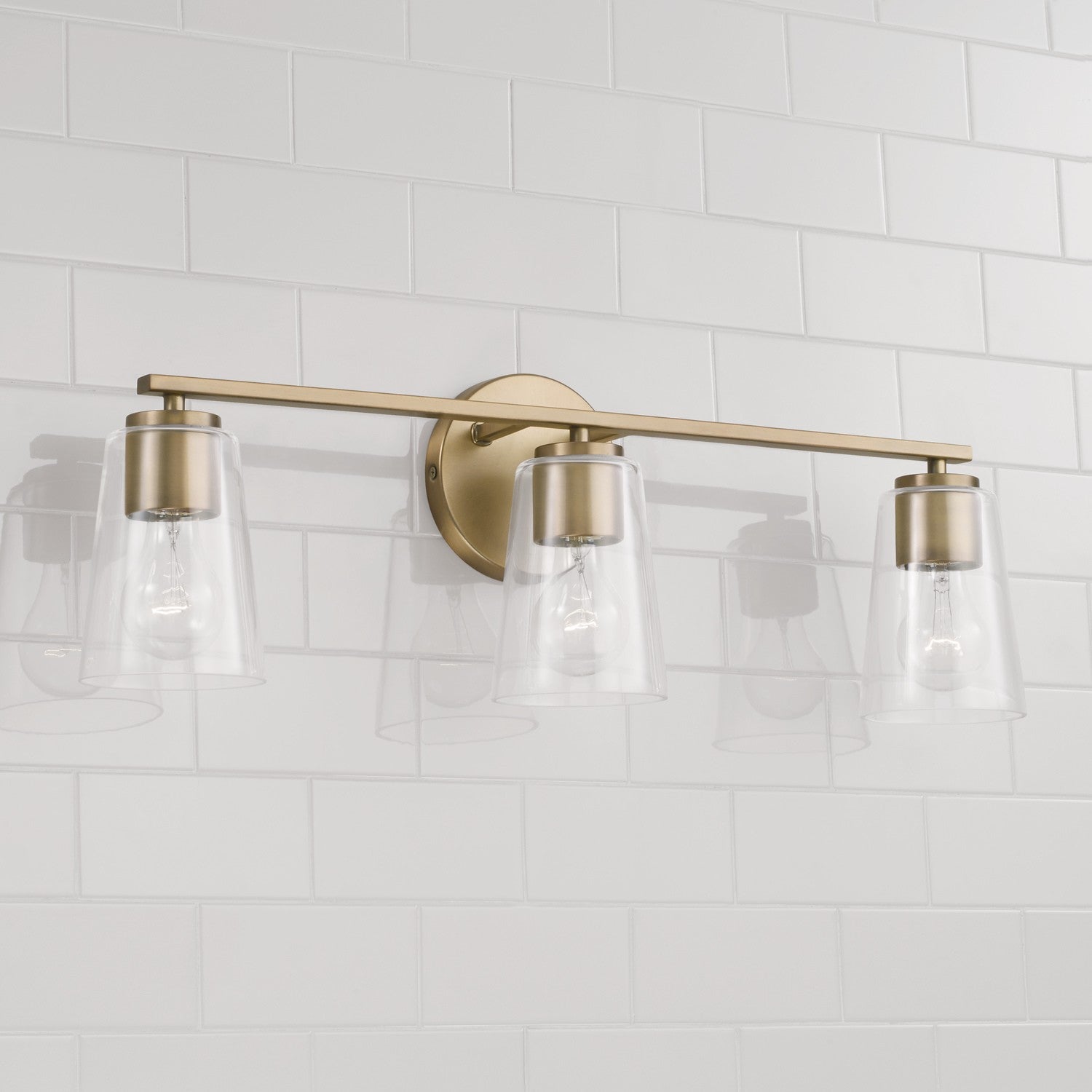 Capital Lighting - 148631AD-537 - Three Light Vanity - Portman - Aged Brass