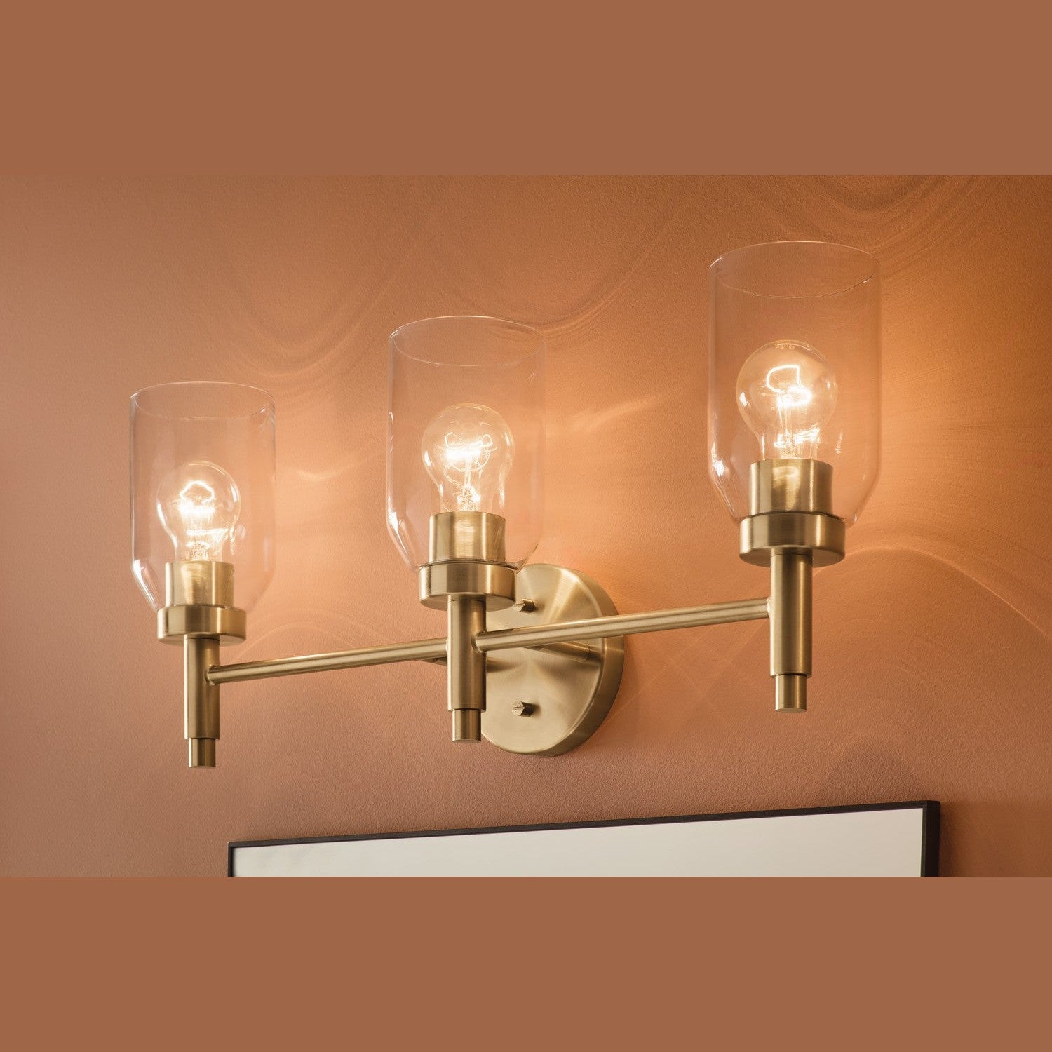 Kichler - 55185CPZ - Three Light Vanity - Madden - Champagne Bronze