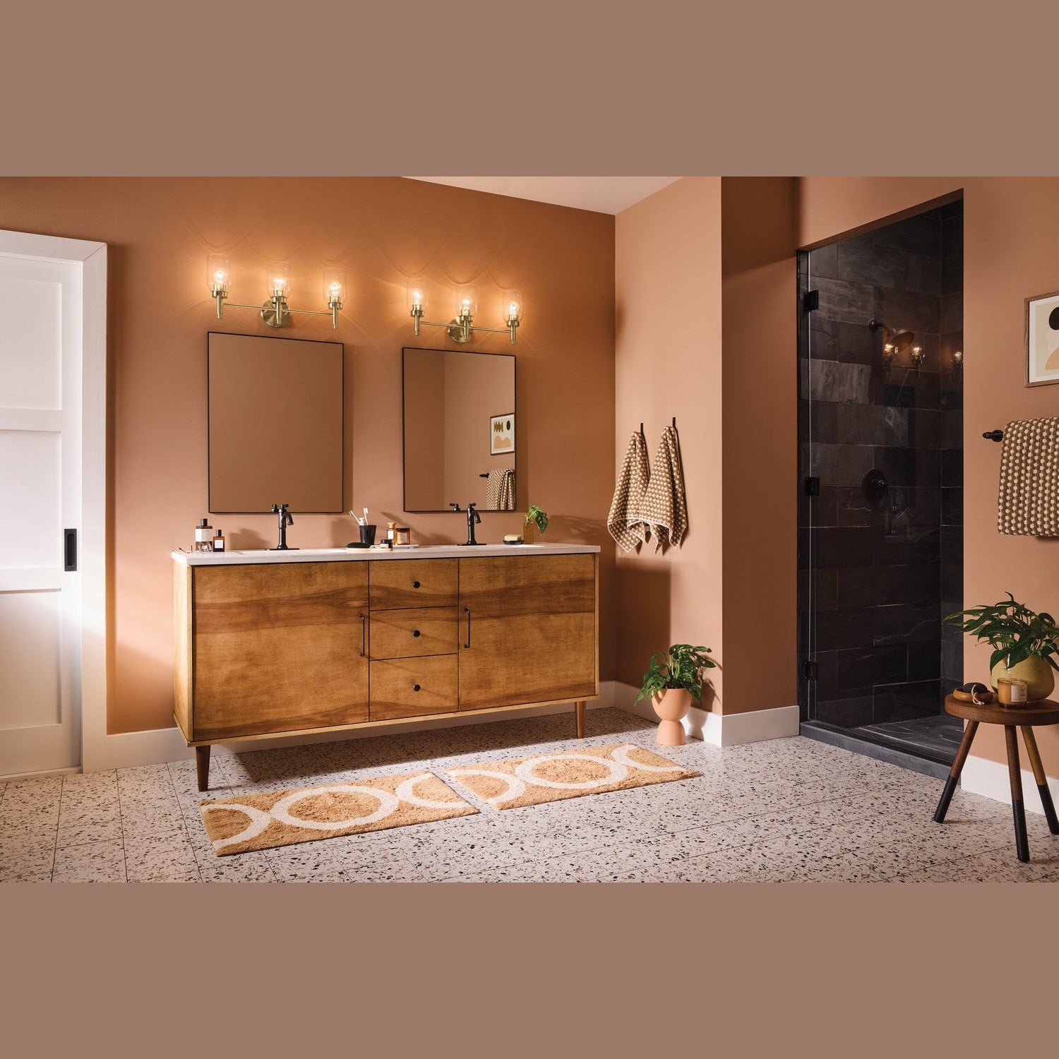 Kichler - 55185CPZ - Three Light Vanity - Madden - Champagne Bronze
