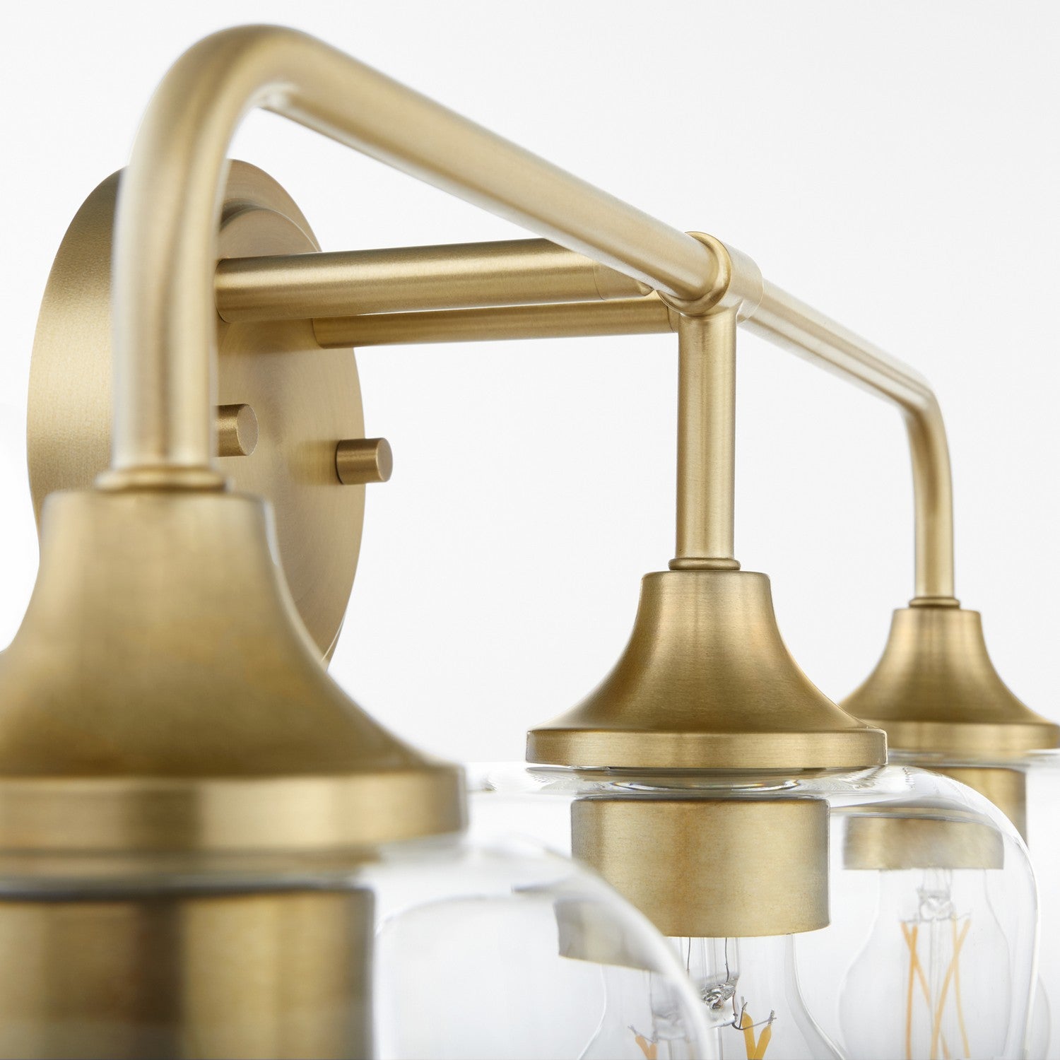 Quorum - 5313-3-80 - Three Light Vanity - Raymond - Aged Brass